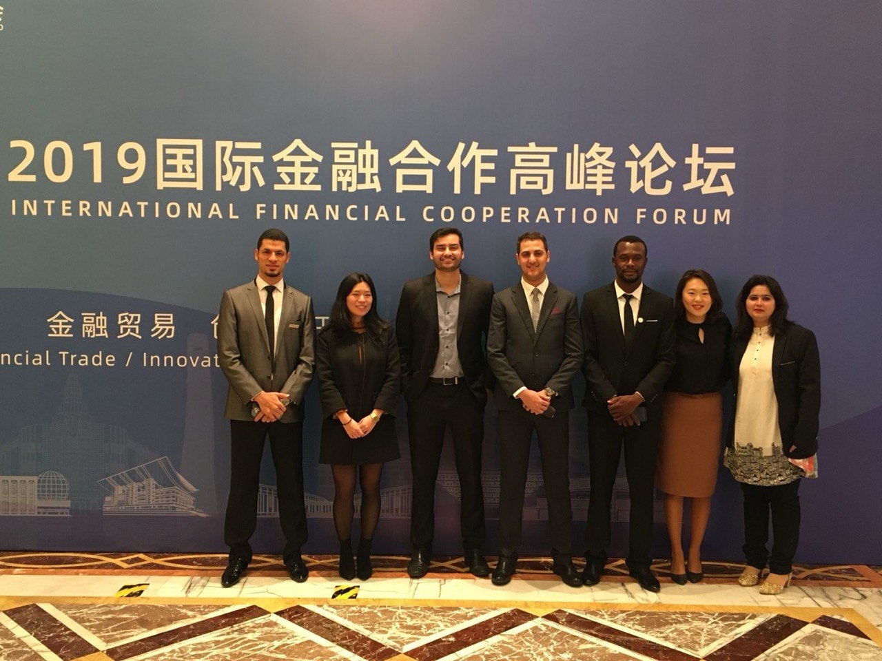 Delegates at the International Financial Cooperation Forum backdrop